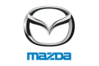 The image features the Mazda logo, a stylized silver M inside an oval with a metallic finish. Below the emblem, the word Mazda appears in bold blue lowercase letters, conveying modernity and motion—precision akin to finding the right locksmith near me in Miami.